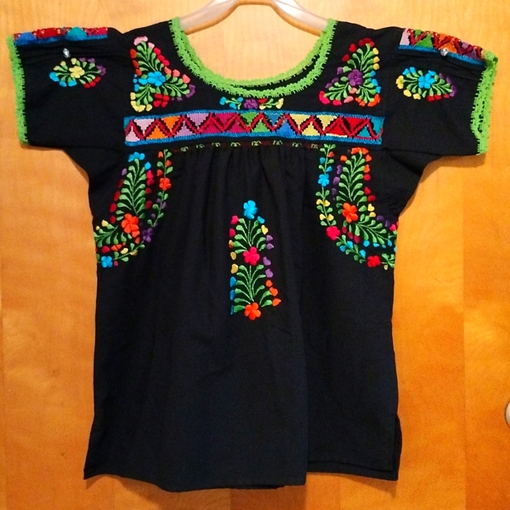 Typical black blouse from Oaxaca. Embroidery of colors.